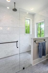 Floor to ceiling tiled walkin shower room
