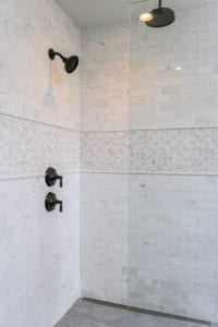 Floor to ceiling tiled walkin shower unit