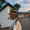Exterior view of the front of the Mountain Modern Vista home, a beautiful residence surrounded by nature and mountains in Waynesville.