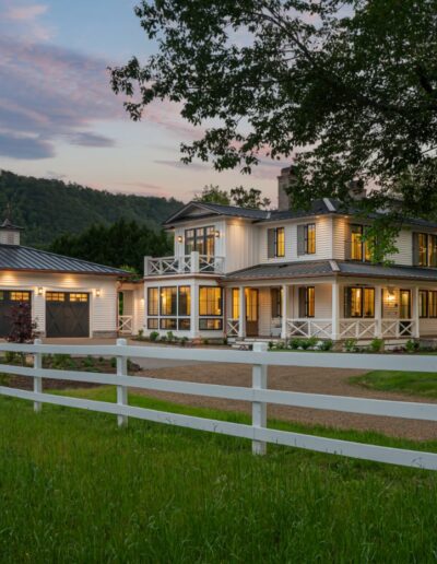 Remodeled energy-efficient luxury home near Asheville, North Carolina, incorporating original farmhouse aspects, locally milled wood, exposed beams, and natural elements.