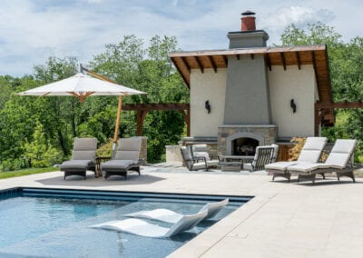 Living Stone Design+Build pool house and firepit